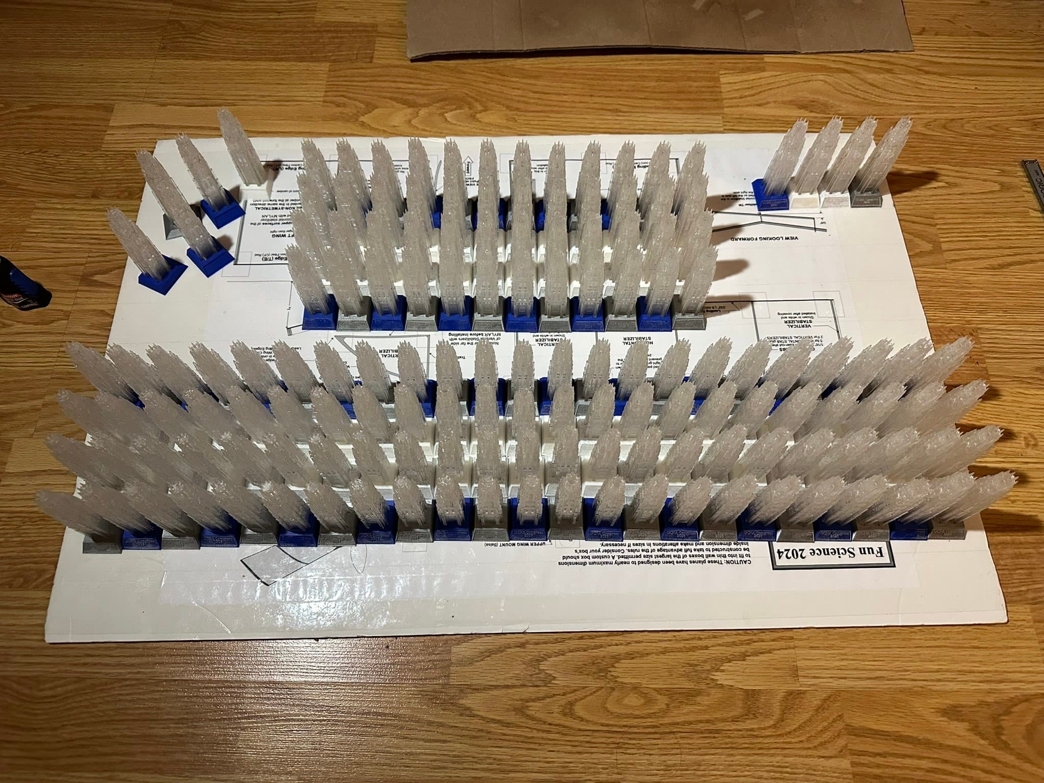 Multiple clear tower prototypes arranged by design and base variant
