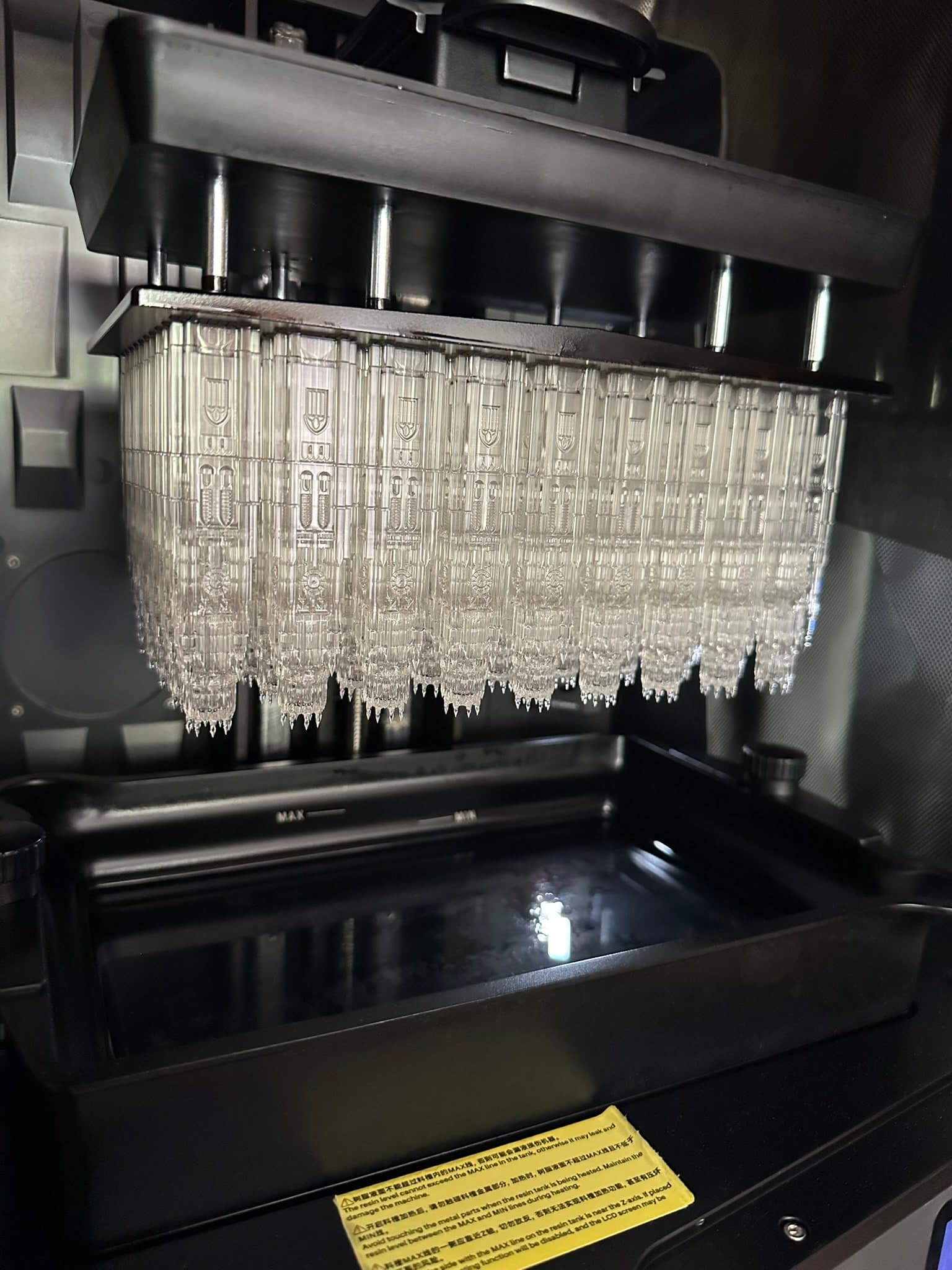 Array of clear Harkness Tower parts being printed
