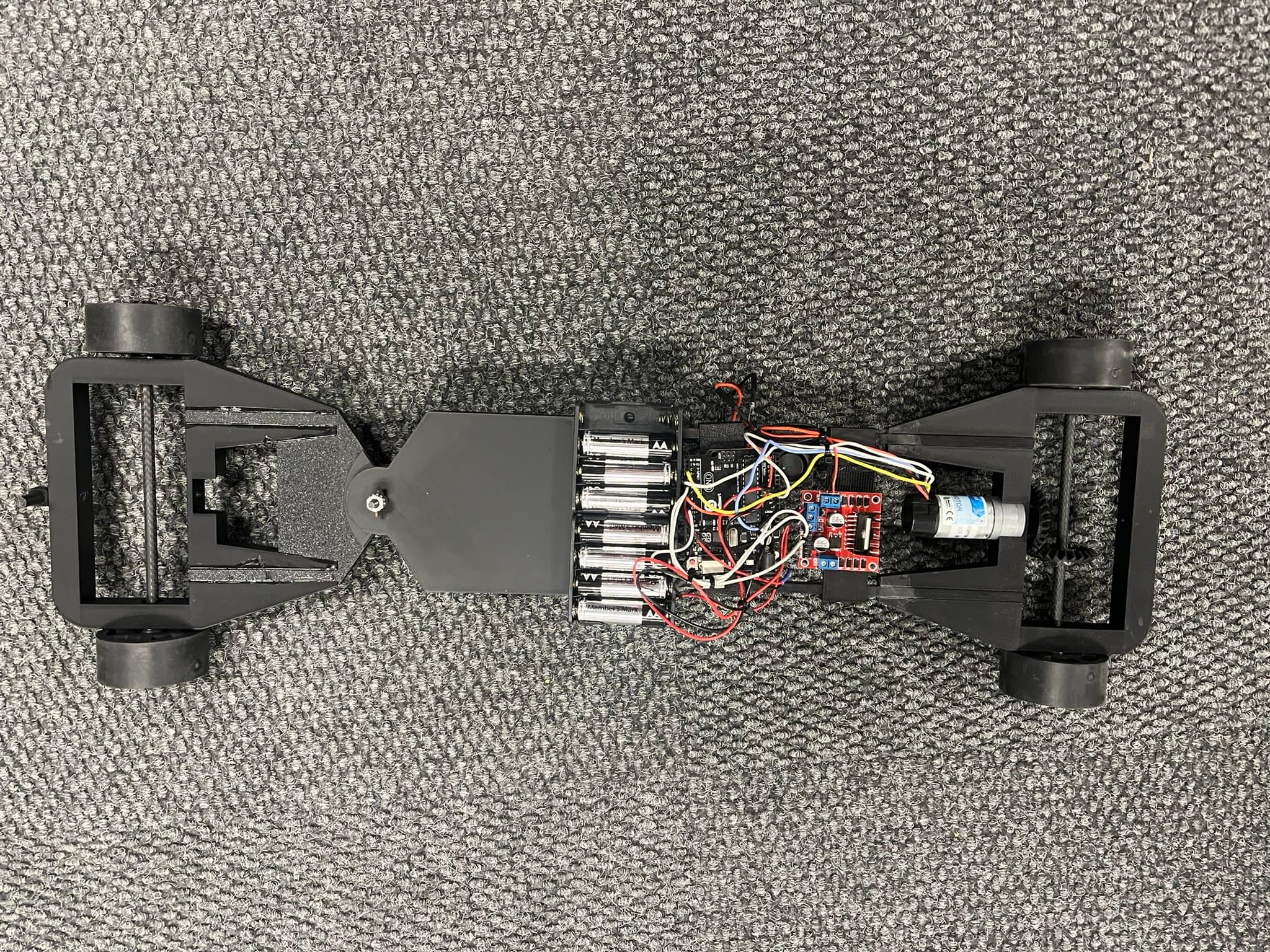 Landscape view of the final autonomous electric vehicle with its drivetrain and control electronics visible