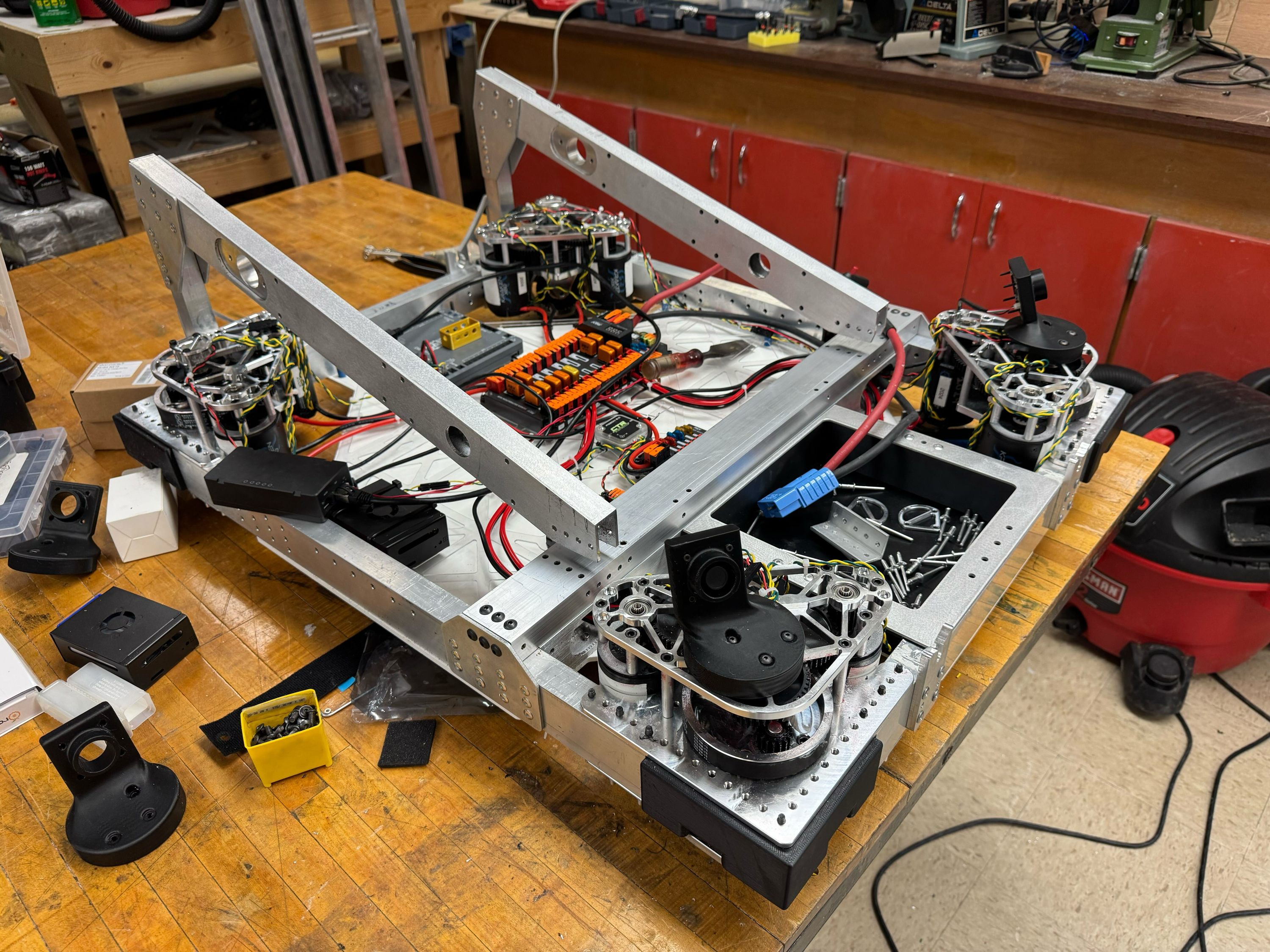 FIRST Robotics swerve-drive chassis under construction in the workshop